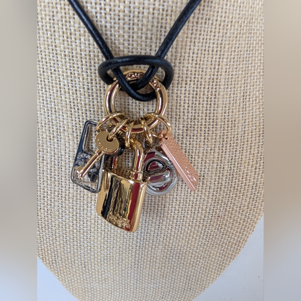 Coach Lock Charm Necklace 18 Inches Length.